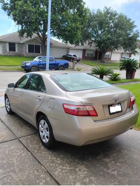 Gold 2009 Toyota Camry LE
