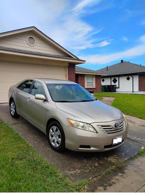 Gold 2009 Toyota Camry LE