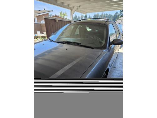 Blue 2001 Ford Taurus SE