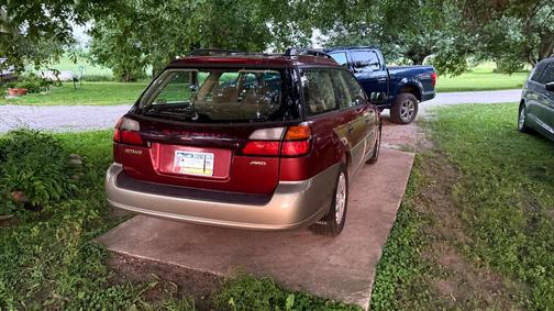 Red 2002 Subaru Outback Base