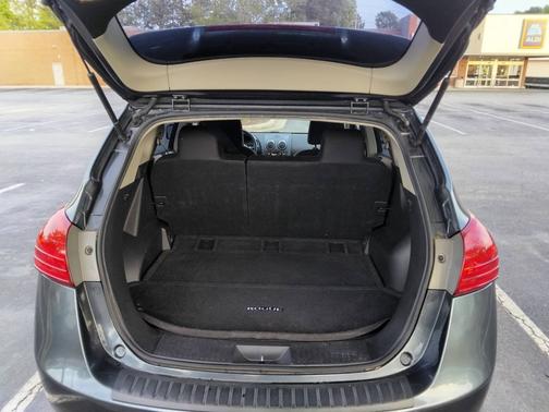 Green 2015 Nissan Rogue Select S