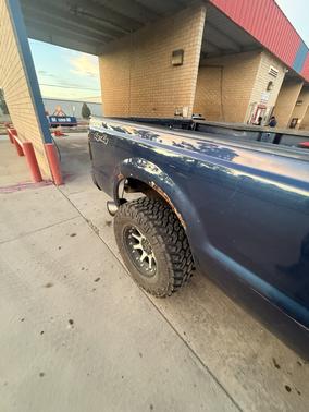 Blue 2009 Ford F-250 Lariat Super Duty Crew Cab