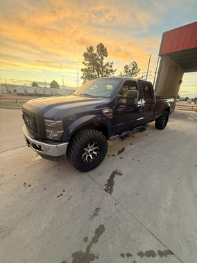 Blue 2009 Ford F-250 Lariat Super Duty Crew Cab