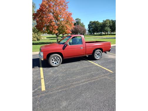 Red 1993 Nissan Pickup Truck Base