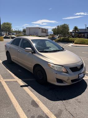 Beige 2010 Toyota Corolla LE
