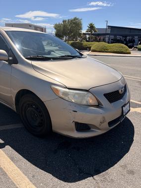 Beige 2010 Toyota Corolla LE