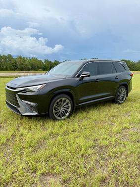Black 2025 Lexus TX 550h+ Luxury