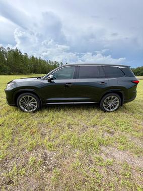 Black 2025 Lexus TX 550h+ Luxury