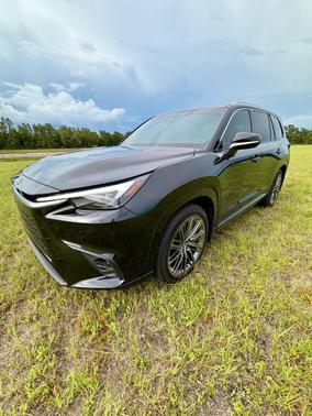 Black 2025 Lexus TX 550h+ Luxury
