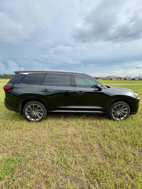 Black 2025 Lexus TX 550h+ Luxury