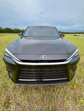 Black 2025 Lexus TX 550h+ Luxury