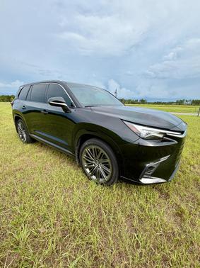 Black 2025 Lexus TX 550h+ Luxury