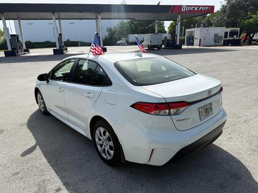 White 2026 Toyota Corolla Hybrid LE