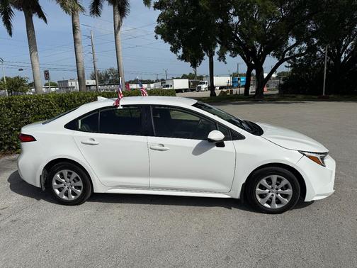 White 2026 Toyota Corolla Hybrid LE