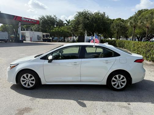 White 2026 Toyota Corolla Hybrid LE