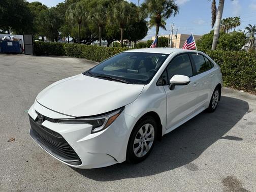 White 2026 Toyota Corolla Hybrid LE