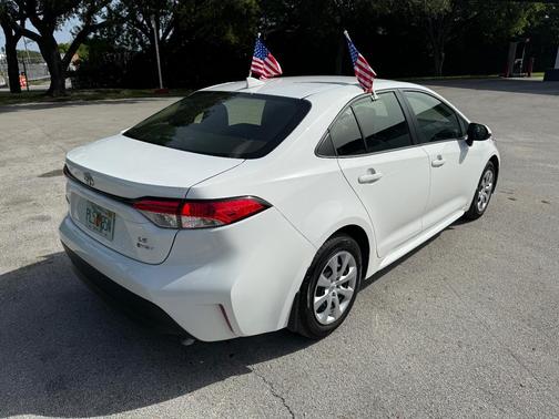 White 2026 Toyota Corolla Hybrid LE