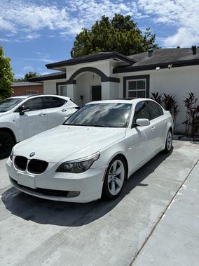 Yellow 2008 BMW 528 i