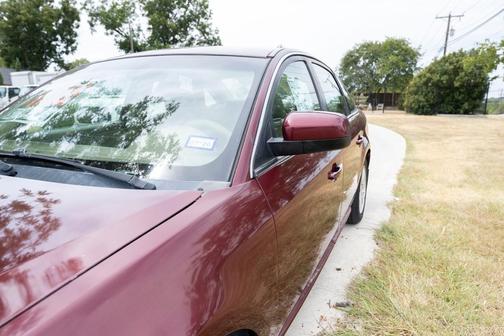 Red 2007 Mercury Montego Base