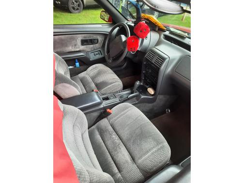 Red 1995 Chrysler LeBaron GTC