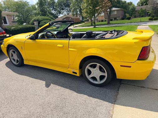 Yellow 2001 Ford Mustang GT