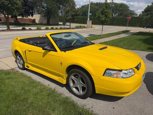 Yellow 2001 Ford Mustang GT