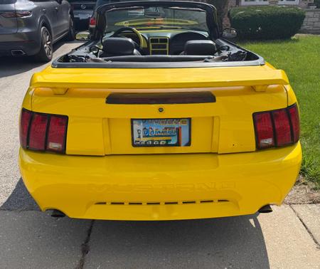 Yellow 2001 Ford Mustang GT