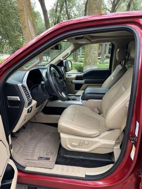 Red 2015 Ford F-150 Lariat