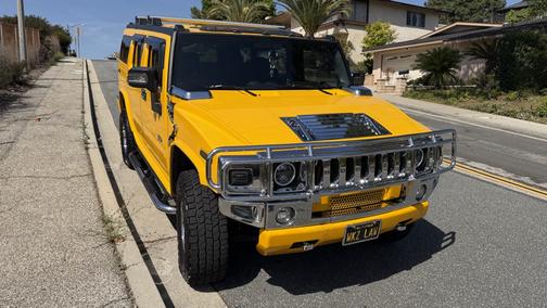 Yellow 2006 Hummer H2 Base