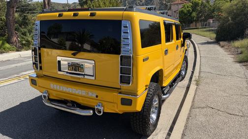 Yellow 2006 Hummer H2 Base
