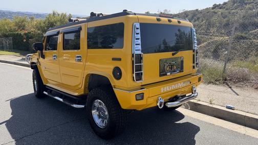Yellow 2006 Hummer H2 Base