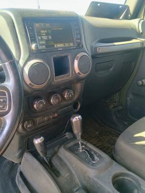 Green 2015 Jeep Wrangler Unlimited Willys Wheeler