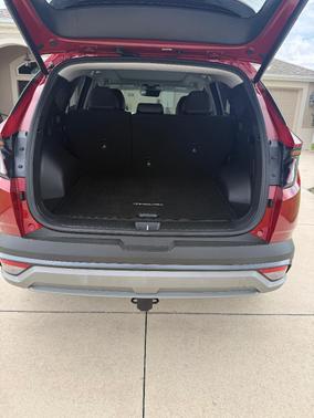 Red 2025 Hyundai TUCSON Hybrid Limited