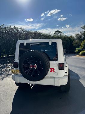 White 2014 Jeep Wrangler Unlimited Sahara