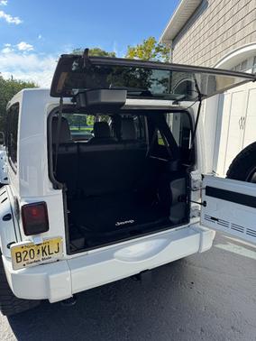 White 2014 Jeep Wrangler Unlimited Sahara