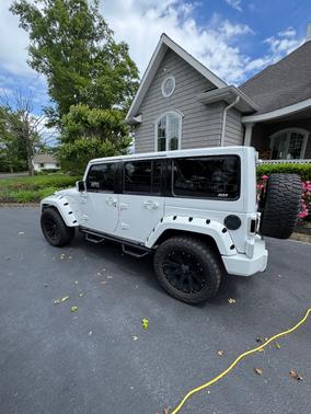 White 2014 Jeep Wrangler Unlimited Sahara