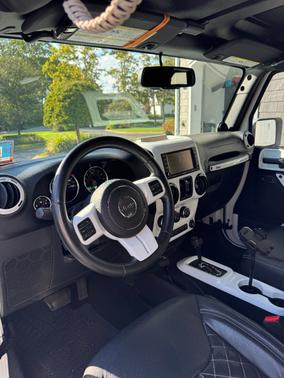 White 2014 Jeep Wrangler Unlimited Sahara