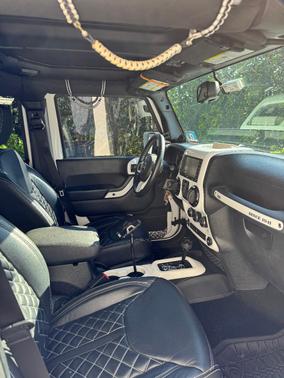White 2014 Jeep Wrangler Unlimited Sahara
