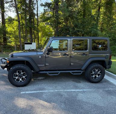 Gray 2016 Jeep Wrangler Unlimited Sport