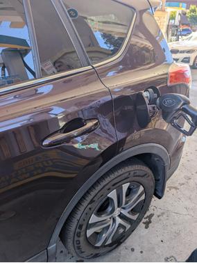 Red 2018 Toyota RAV4 LE