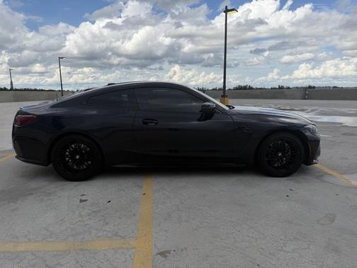 Black 2025 BMW M4 Competition xDrive