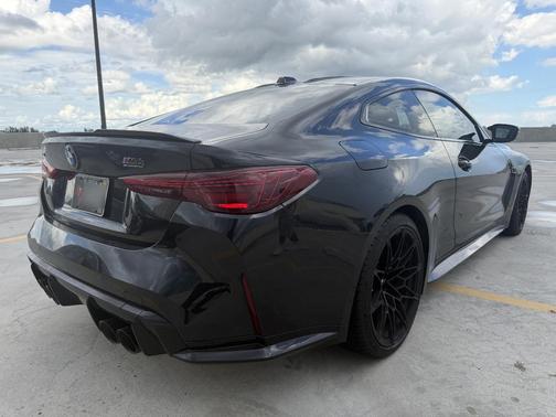 Black 2025 BMW M4 Competition xDrive