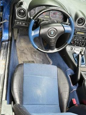 Blue 1999 Mazda MX-5 Miata Base