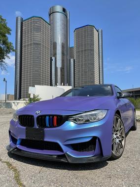 Blue 2017 BMW M4 Base