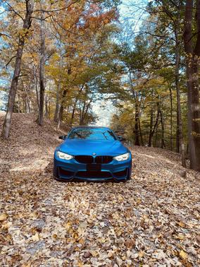 Blue 2017 BMW M4 Base