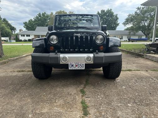 Black 2011 Jeep Wrangler Unlimited Sahara