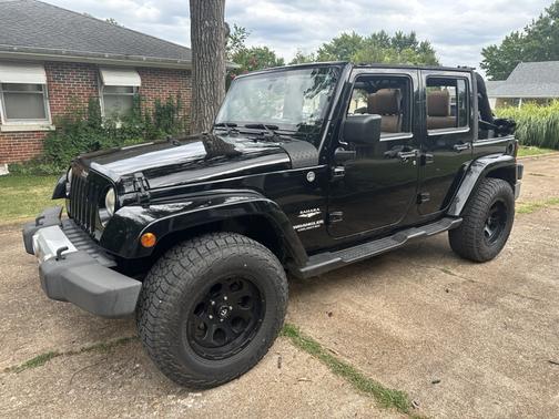 Black 2011 Jeep Wrangler Unlimited Sahara