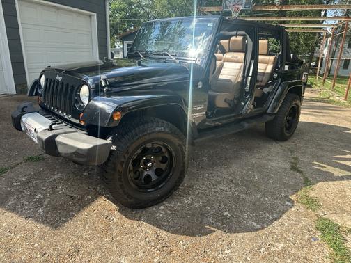 Black 2011 Jeep Wrangler Unlimited Sahara