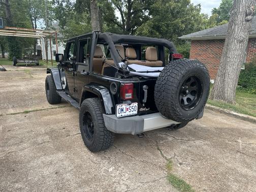 Black 2011 Jeep Wrangler Unlimited Sahara