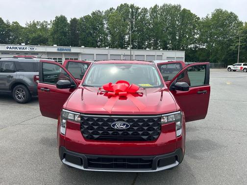 Red 2025 Ford Maverick XLT